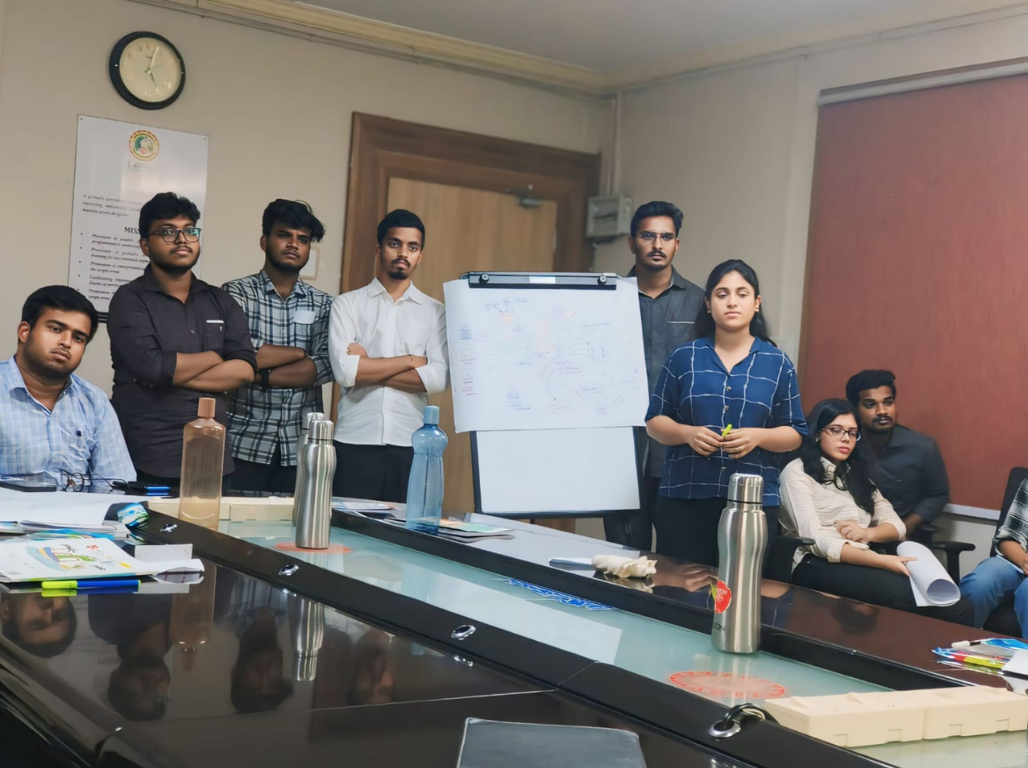 Training session with participants around a hand-drawn learning map