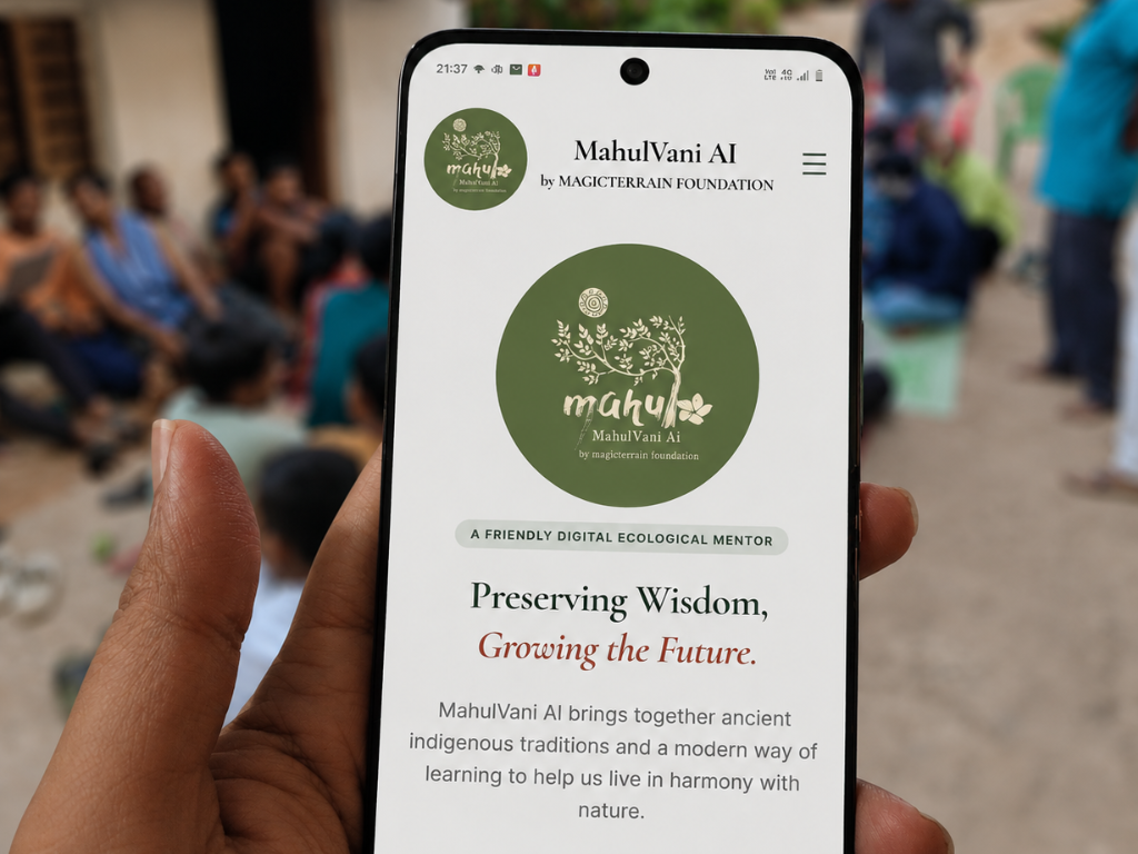 A hand holding a phone showing the MahulVani AI app during a village session